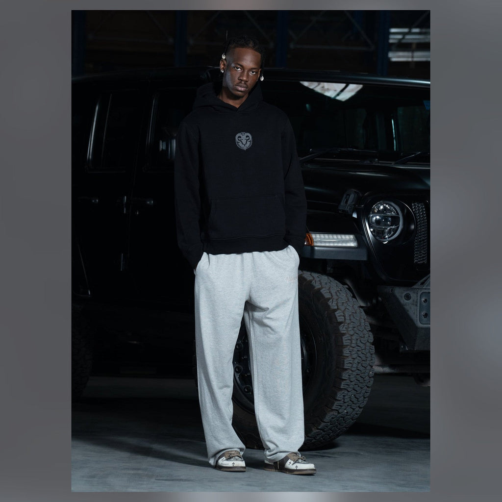 Man wearing a Virgous grey jogger outfit