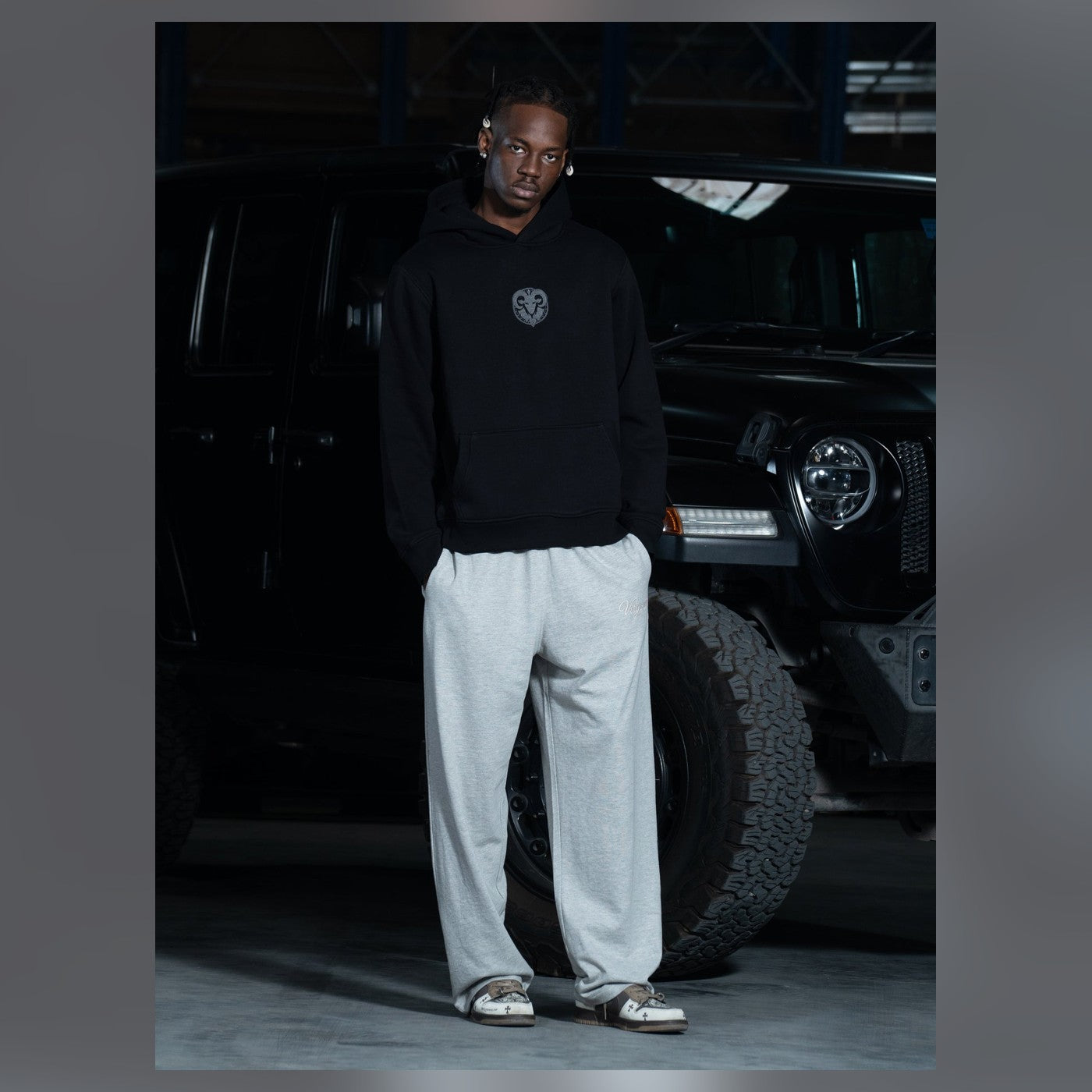 Man wearing a Virgous grey jogger outfit